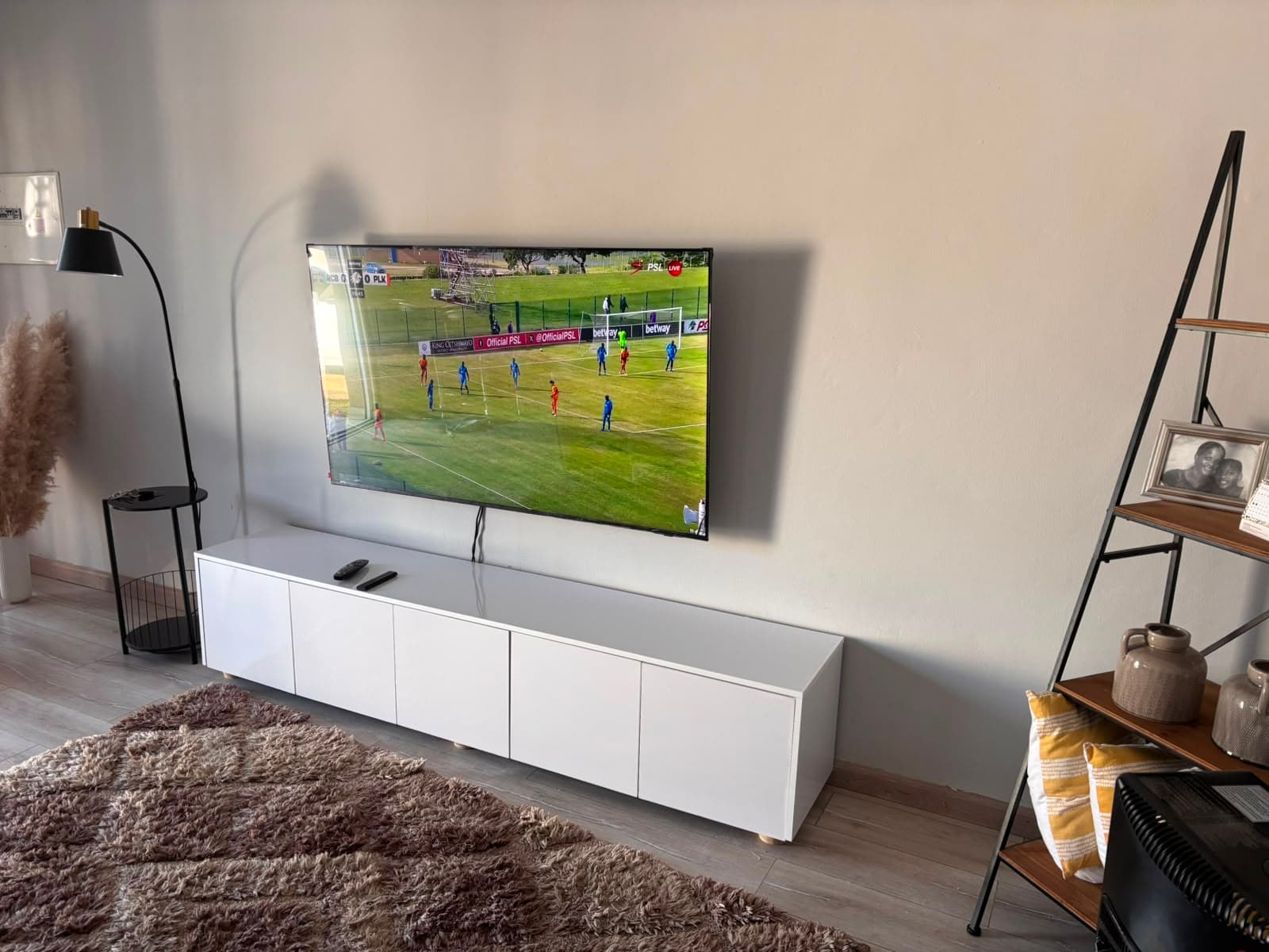 Floating TV unit in a furnished living room